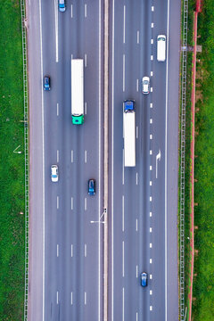 Abstract aerial view of motorway A28 with cars and trucks, Amersfoort, province of Utrecht, The Netherlands.