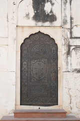 Vintage door at red fort new delhi, india