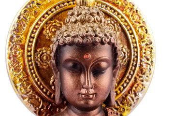 Buddha Figurine Face isolated on White Background