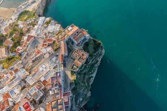 Aerial view of Peschici old town, a small town on the cliffs along the Ionian Sea, Foggia, Gargano Natural Park, Puglia, Italy.