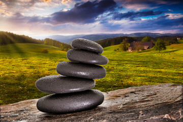 Wellness stones in front of landscape