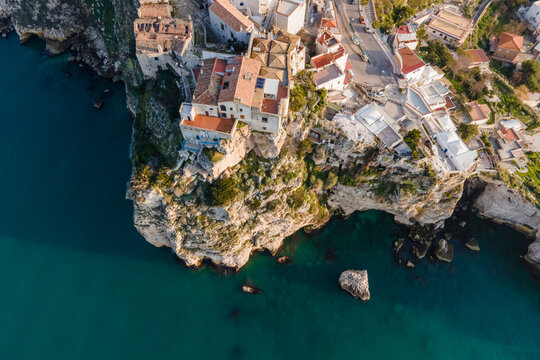 Aerial view of Peschici old town, a small town on the cliffs along the Ionian Sea, Foggia, Gargano Natural Park, Puglia, Italy.