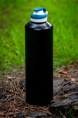 black metal bottle mockup outdoor