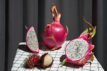 Dragon fruit. Pitahaya. Tropical magenta fruit. Nature mort clean minimal style. High quality photo