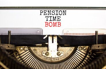 Pension time bomb symbol. Concept words Pension time bomb typed on an old retro typewriter on a...