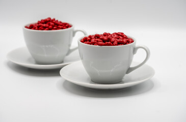 Cinnamon mini hearts in the shape of heart with  two coffee cups