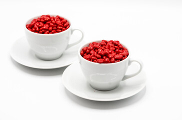 Cinnamon mini hearts in the shape of heart with  two coffee cups