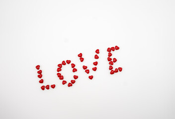 Cinnamon mini hearts in the shape of word love