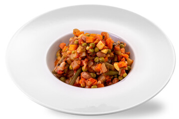 Vegetable stew (carrots, potatoes, peas, beans) in white dish