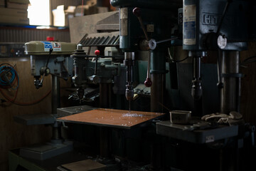 Part machining with drilling machine