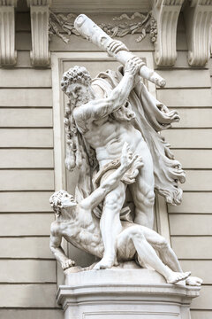 Statues of Hercules and Busiris of 18th century at Hofburg Palace in Vienna, Austria. 