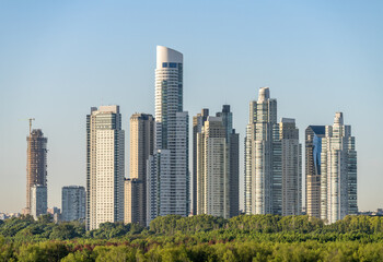 Large modern apartment buildings of Puerto Madero by the shoreline in Buenos Aires Argentina