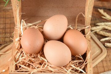 natural chicken egg on the wooden table, rustic free-range chicken natural farm food
