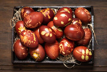 Traditional easter eggs dyed in onion peel - 579843423