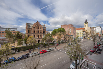 Buildings on Bravo Murillo street in Madrid on a day of cloudy skies