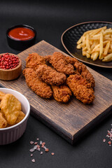 Delicious crispy breaded chicken wings grilled with spices and herbs