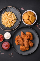 Delicious crispy breaded chicken wings grilled with spices and herbs