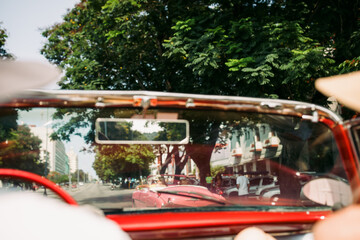 Riding in Vintage Red Car in Havana Cuba