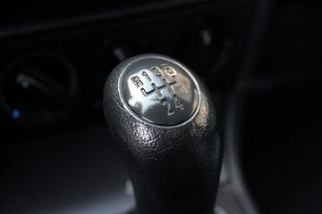 The handle of switching of transfers in the car. Car gear. Power engine gear. A manual shift car...