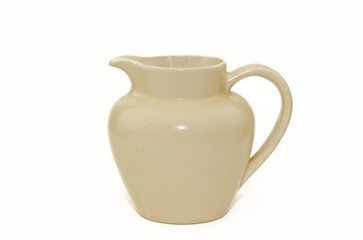 White antique pottery pitcher isolated on white background