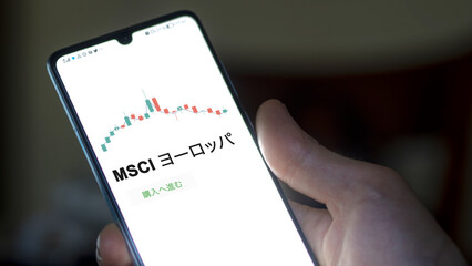Investor analyzing an ETF. Funds stocks exchange ETFs Japanese text: msci europe, buy. MSCI ヨーロッパ 証券取引所 投資 shares