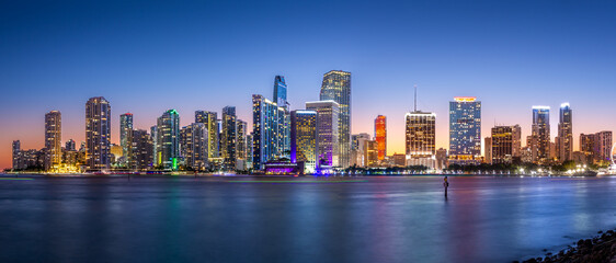 Panorama of Miami, Florida at dusk. Miami is a majority-minority city and a major center and leader in finance, commerce, culture, arts, and international trade.