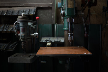 Part machining with drilling machine