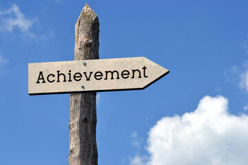 Achievement - wooden signpost with one arrow, sky with clouds