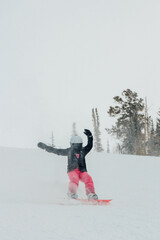 child snowboarding at resort