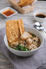 bakso malang is a traditional food Indonesia made from meatball, tofu, fried dumpings, rice noodle and beef soup