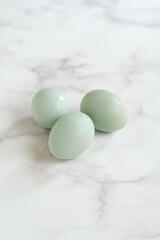 Salted boiled eggs in marmer background