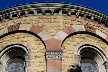 Details of the ornate façade of the neo-Romanesque parish church of st. michael in cologne's...