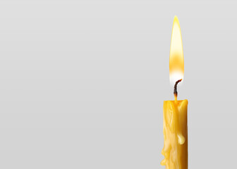 Burning church candle on light background. Space for text