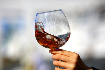 a glass of port wine in hand, portugal drink alcohol