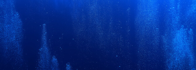 Naklejka premium bubbles under water diving background