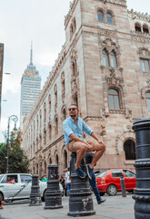 Naklejka premium asian guy traveling alone