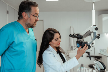 doctor and assistant in a dental clinic 