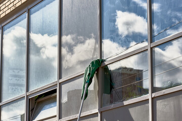 window washing, washing a street shop window