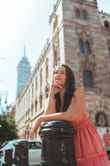 Fototapeta premium portrait of a beautiful girl in the city