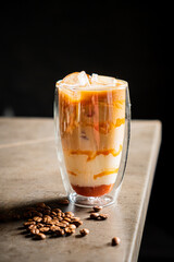 iced coffee with caramel on table