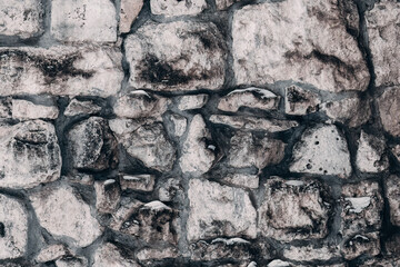 Stonework wall for background and texture. Gray rock material