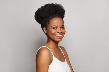 Happy woman laughing on white background