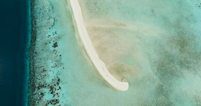 Aerial view of sandy beach and coral reef. Sandbar and atoll. Timba Timba islet. Tun Sakaran Marine Park. Borneo, Sabah, Malaysia.
