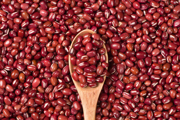 azuki beans seeds in spoon texture background