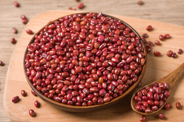 Azuki beans or red beans in wooden plate on  table