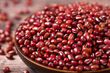 Azuki beans or red beans on wooden table