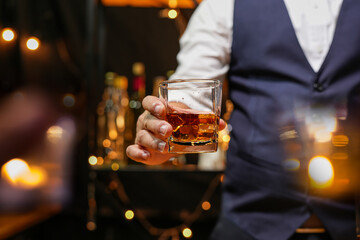 Bartender pouring Whiskey, on  bar,
