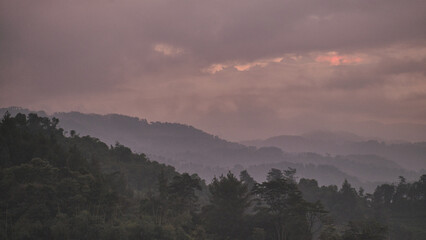 The Enchanting Beauty of an Evening Mountain View: Captured in a Yellow Sky Low-Light Photo