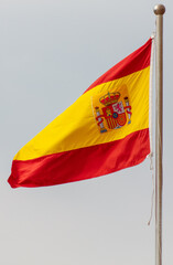 Flag of Spain against the sky.