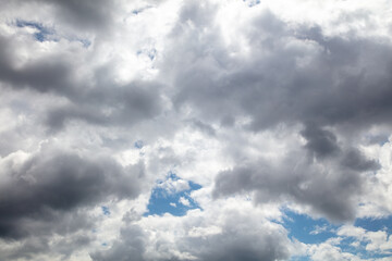 Fototapeta premium Thunderclouds on the blue sky